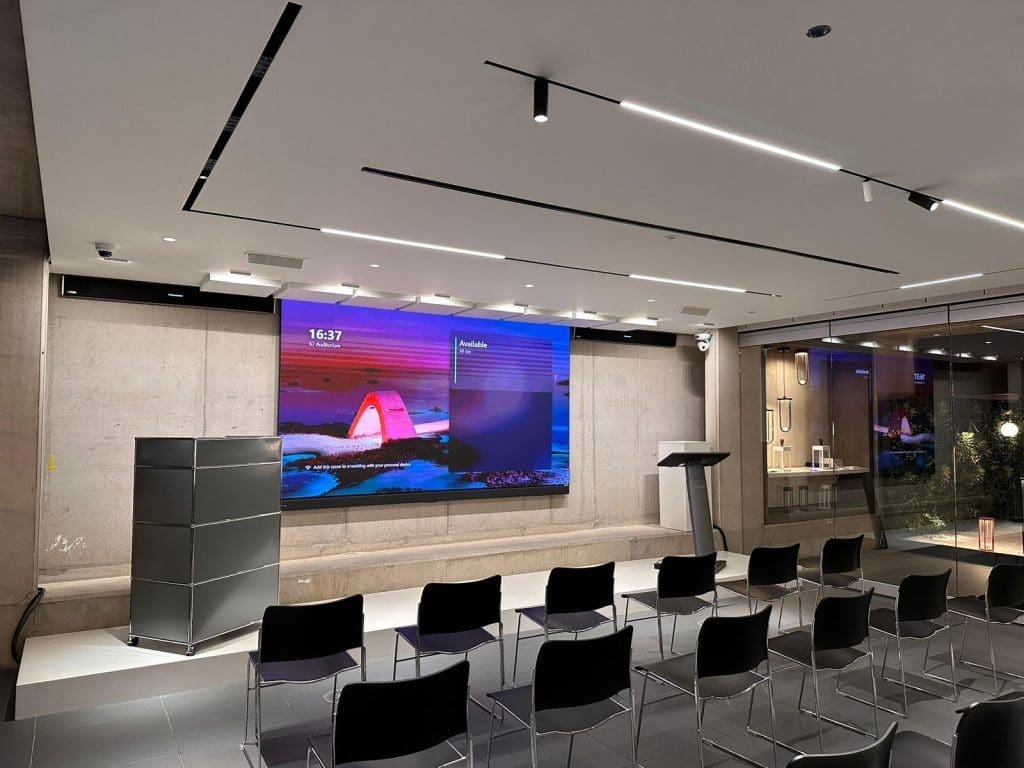 conference room with chairs and a projector screen